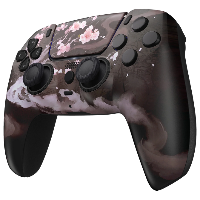 PS5 DualSense Controller mit filigranen Kirschblütenmustern auf rosafarbenem Hintergrund.